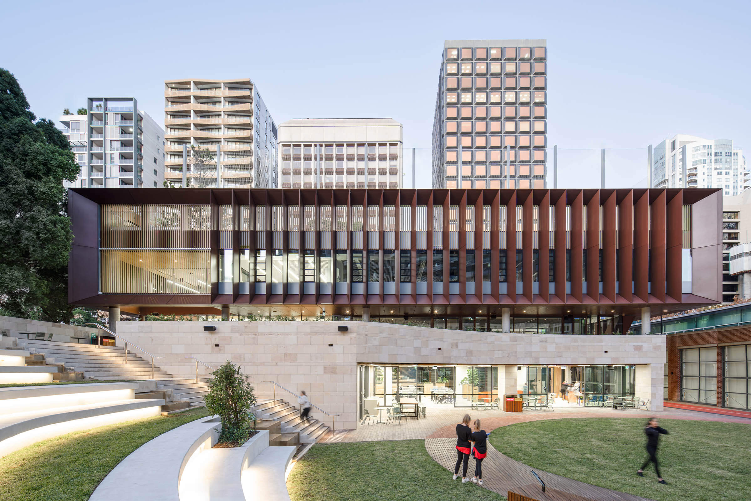 001-hero-image-students-and-teachers-mingle-outside-new-building-in-landscaped-area-Monte-Scientia-Richard-Crookes-Constructions-Education-Private