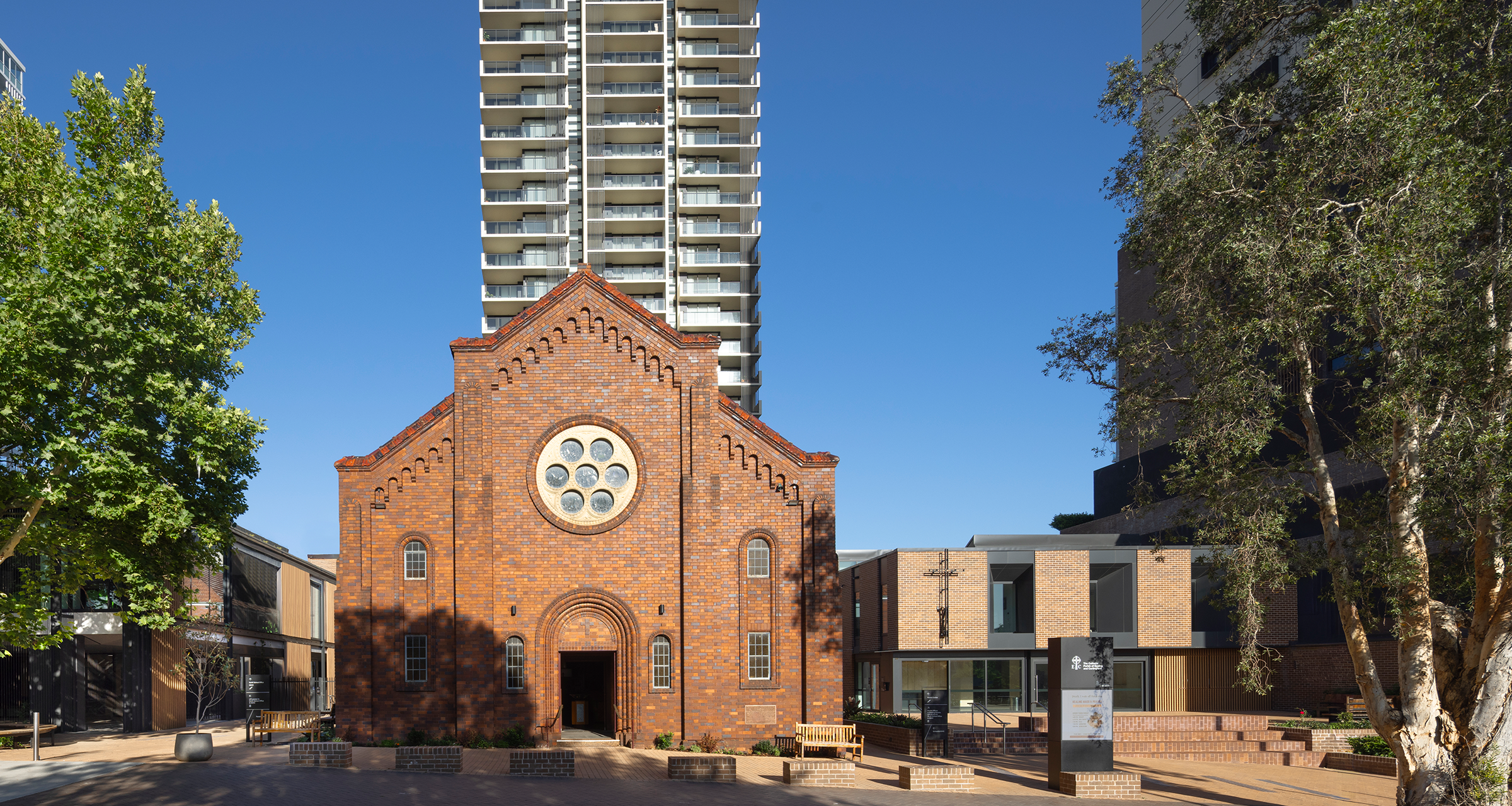 005-landscape-hero-street-view-church-with-lifestyle-living-vertical-tower-in-background-the-cambridge-richard-crookes-constructions