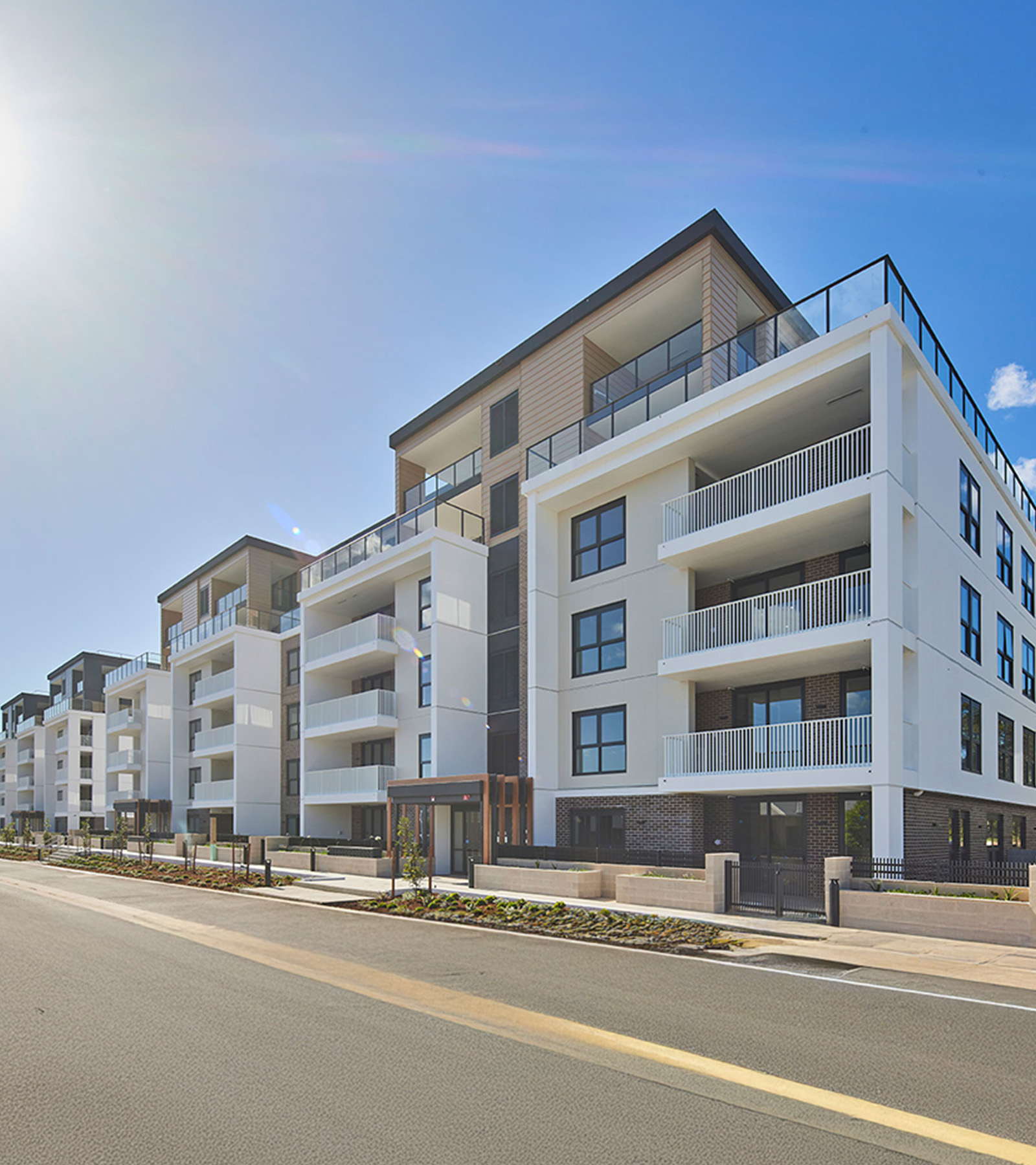 002-mobile-hero-image-sunlit-street-view-buildings-b-and-c-richard-crookes-constructions-retirement-living-2025
